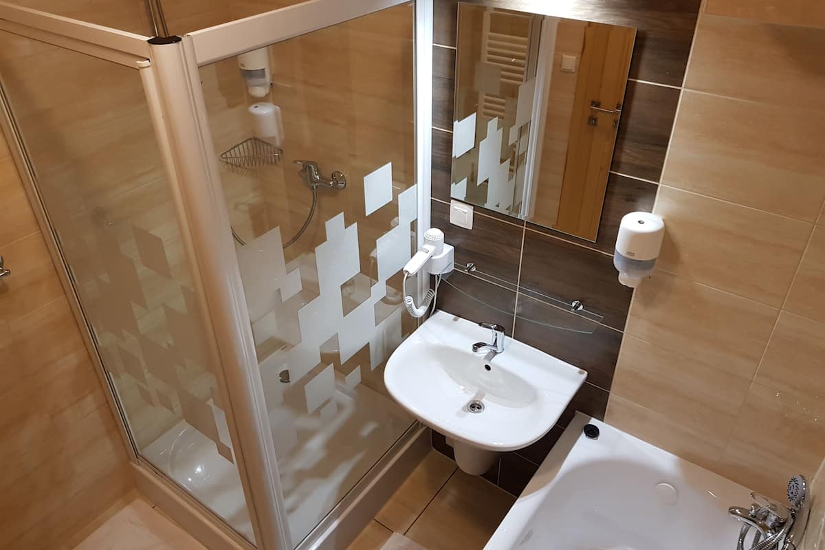 double or twin room | bathroom | shower, hair dryer, bathrobes, towels