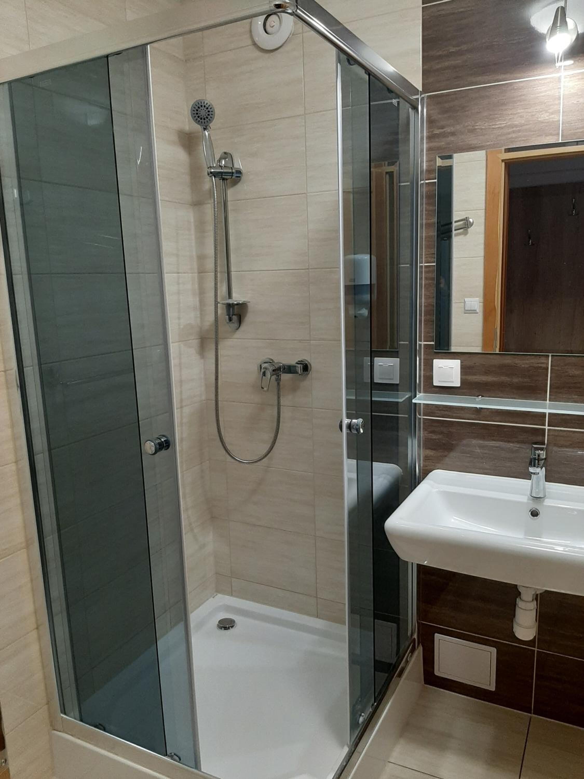 shower, hair dryer, bathrobes, towels