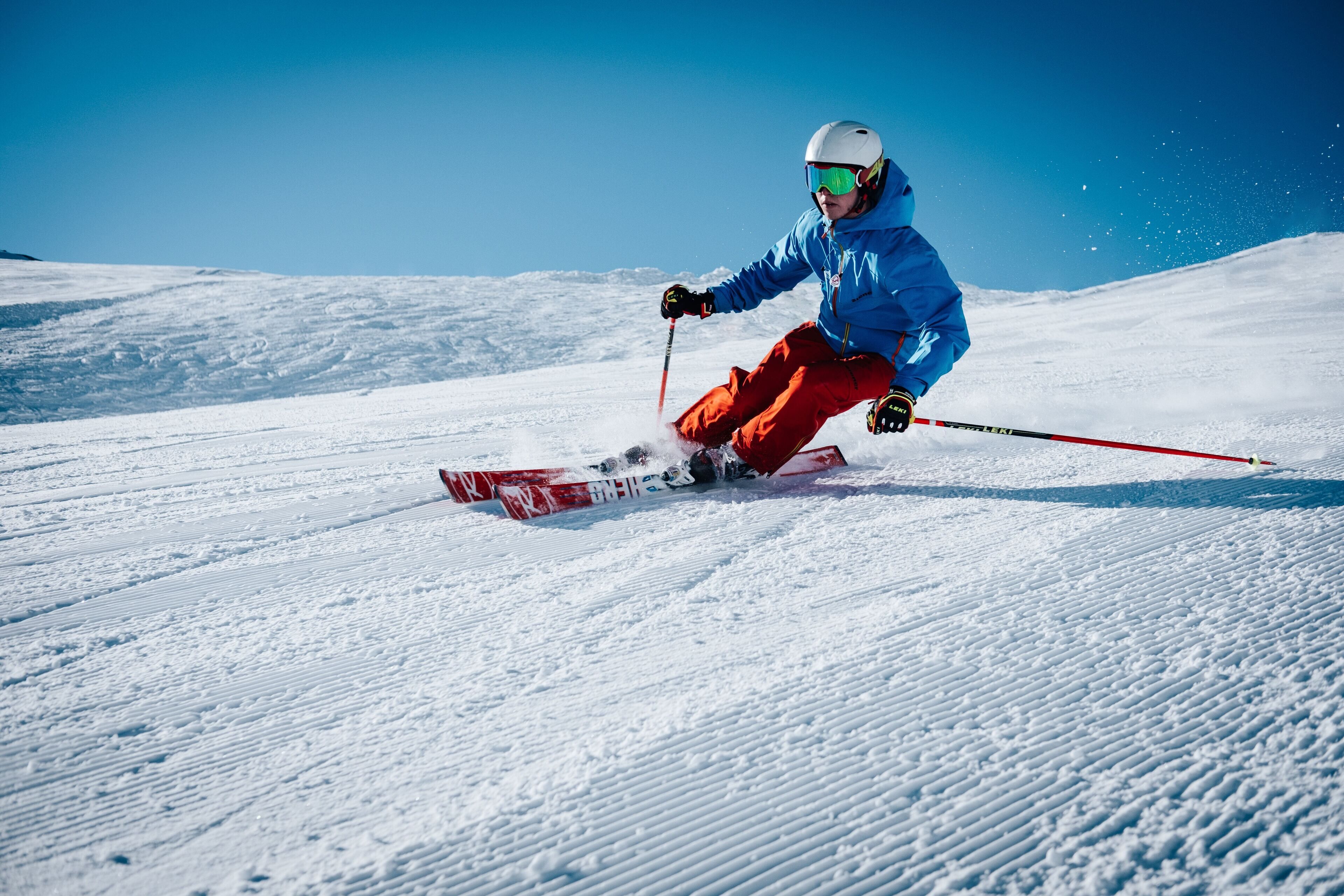 A person skiing on a snowy slope.