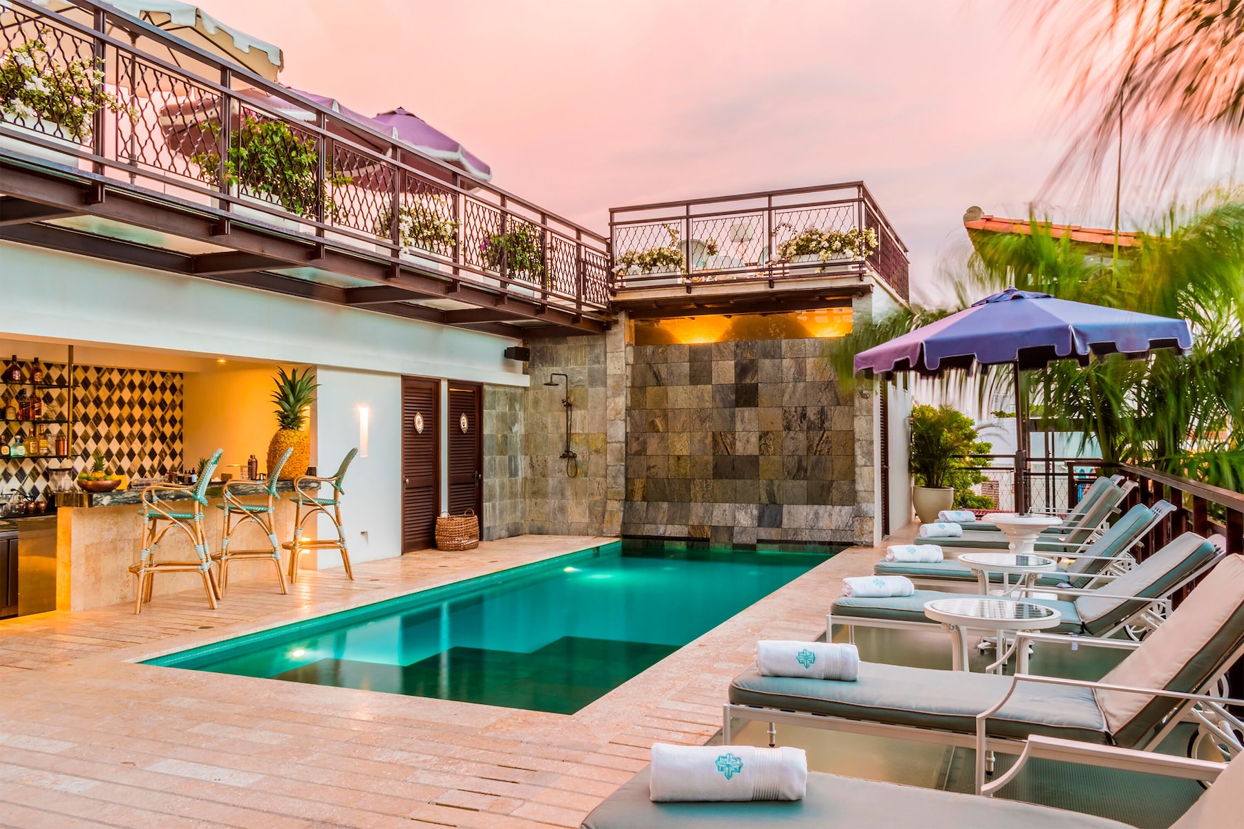 Indoor pool, outdoor pool, pool umbrellas, pool loungers