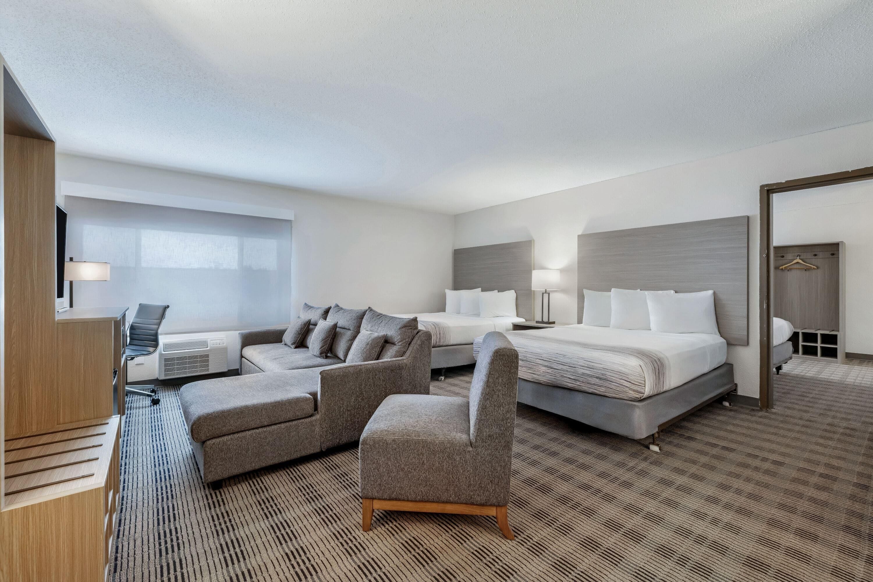 Family Suite, Multiple Beds, Non Smoking | Hypo-allergenic bedding, desk, blackout curtains, iron/ironing board