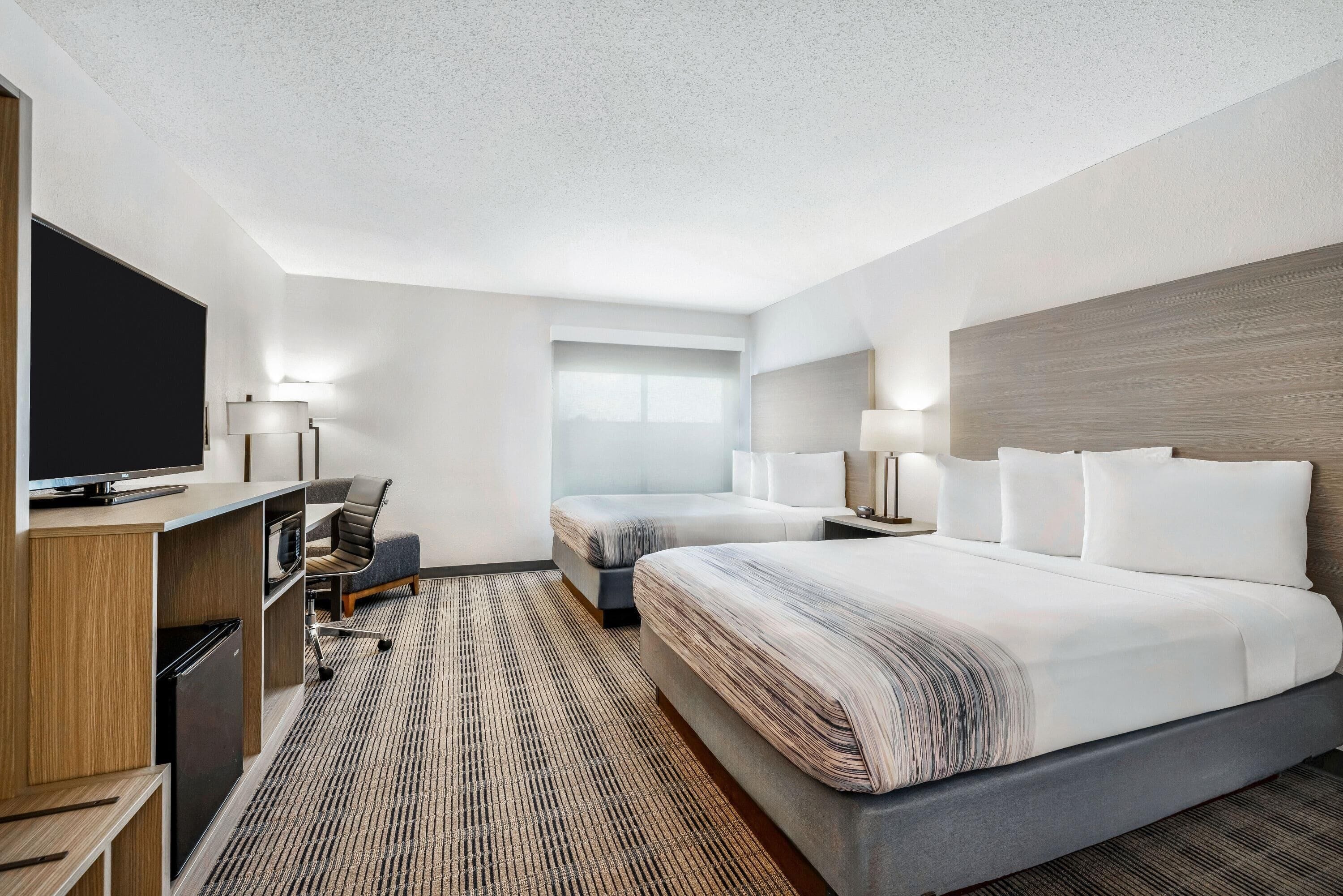 Room, 2 Queen Beds, Non Smoking | Hypo-allergenic bedding, desk, blackout curtains, iron/ironing board