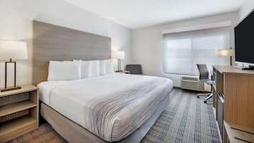 Hypo-allergenic bedding, desk, blackout drapes, iron/ironing board