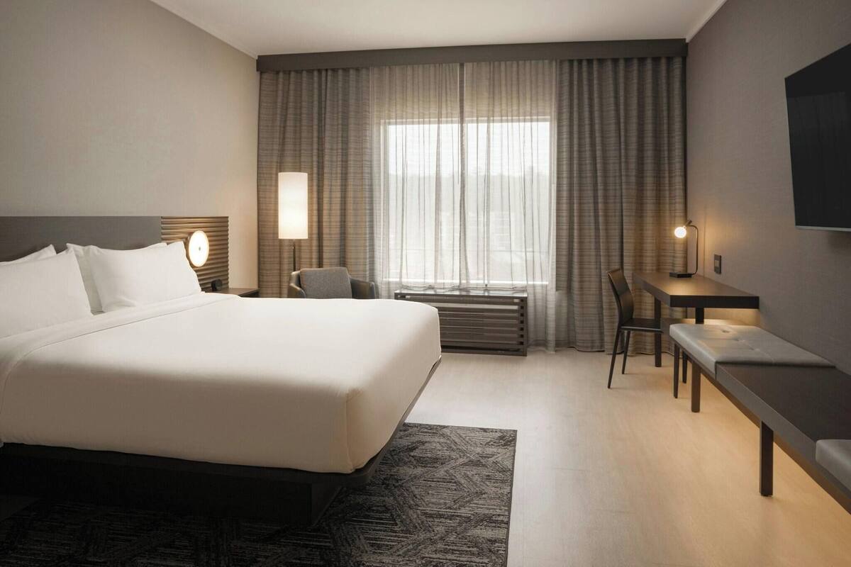 Premium bedding, down duvets, pillow-top beds, in-room safe