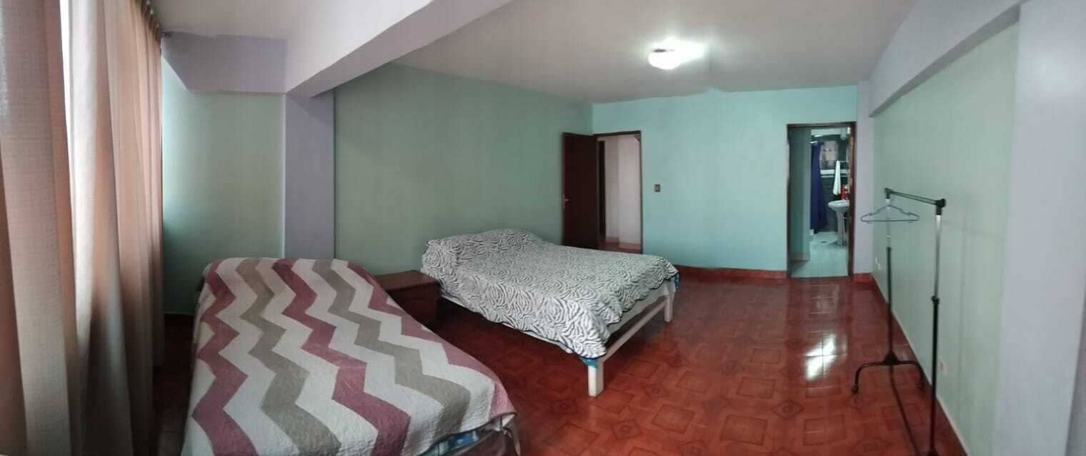 Apartamento premium, 2 quartos, vista para a cidade | 2 quartos, edredons de pluma, ferros/tábuas de passar roupa