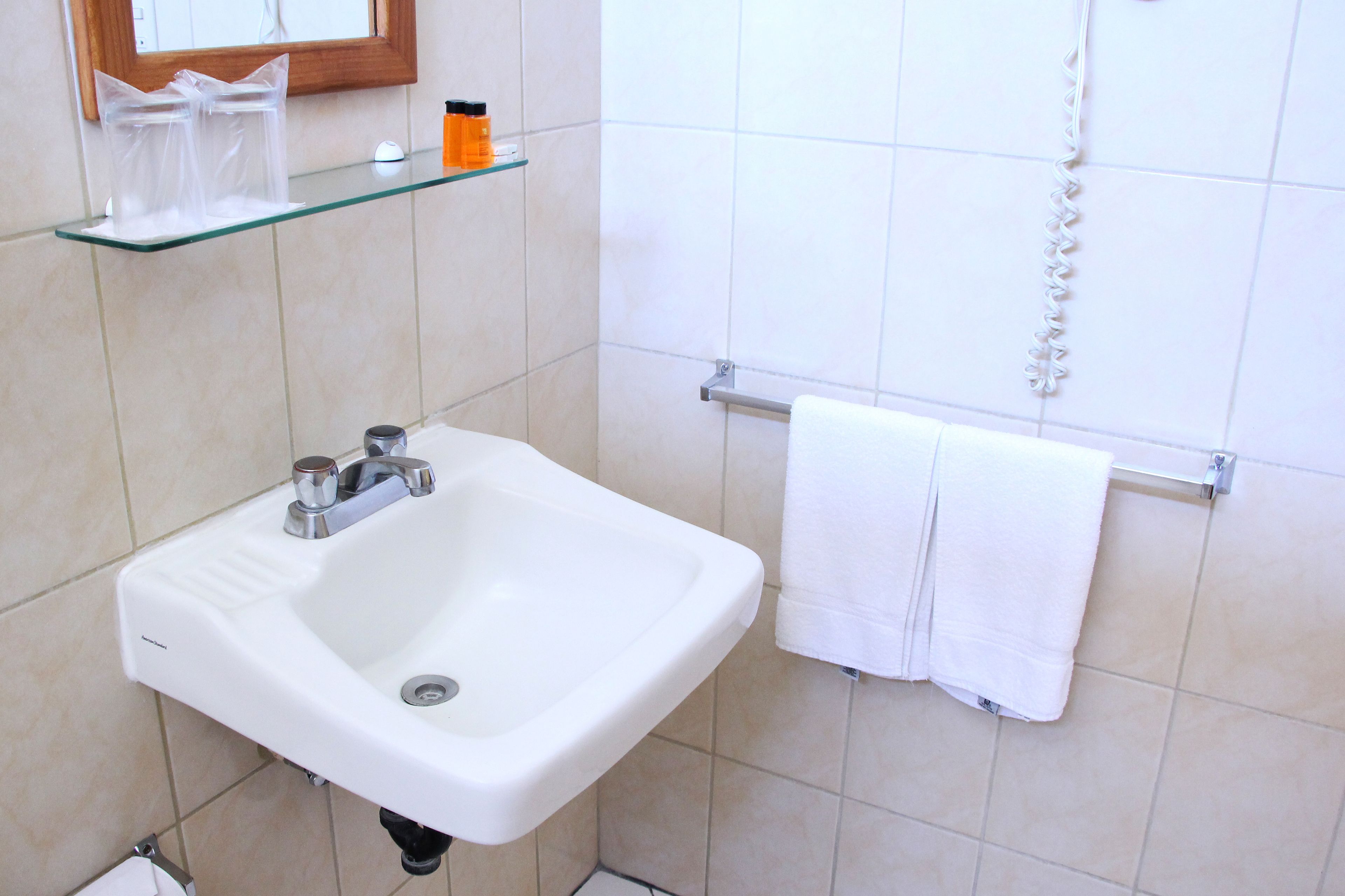standard double or twin room | bathroom | free toiletries, hair dryer, towels