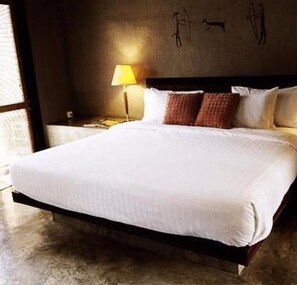 Suíte luxo, 1 quarto | Cofres nos quartos, cortinas blackout