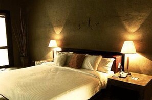 Suíte executiva | Cofres nos quartos, cortinas blackout