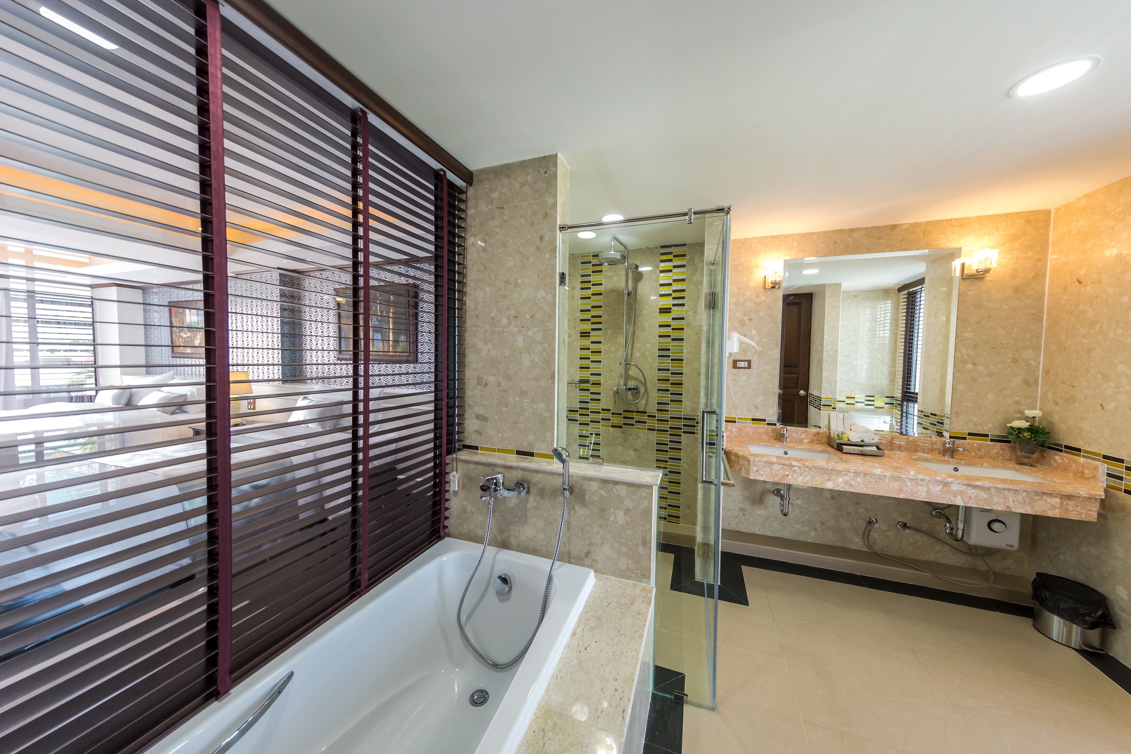 premier corner room | bathroom | free toiletries, hair dryer, bathrobes, slippers
