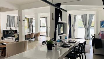 Luxury Villa | Living area | Books, stereo