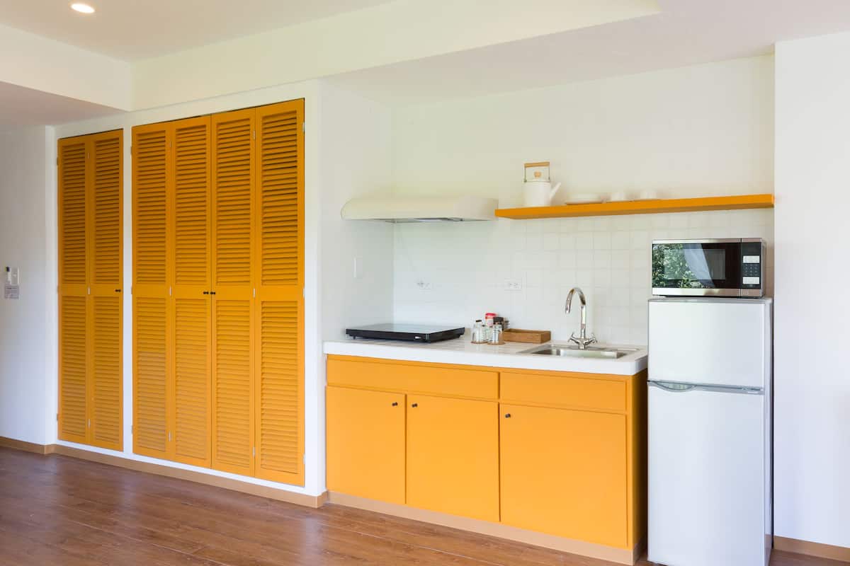 deluxe triple room (with complementary airport shuttle services) | premium bedding, down duvets, in-room safe, desk