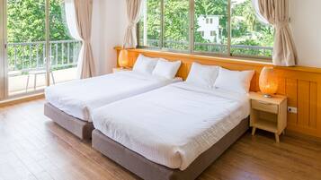 Deluxe Triple Room (with Complementary Airport Shuttle Services) | Premium bedding, down comforters, in-room safe, desk