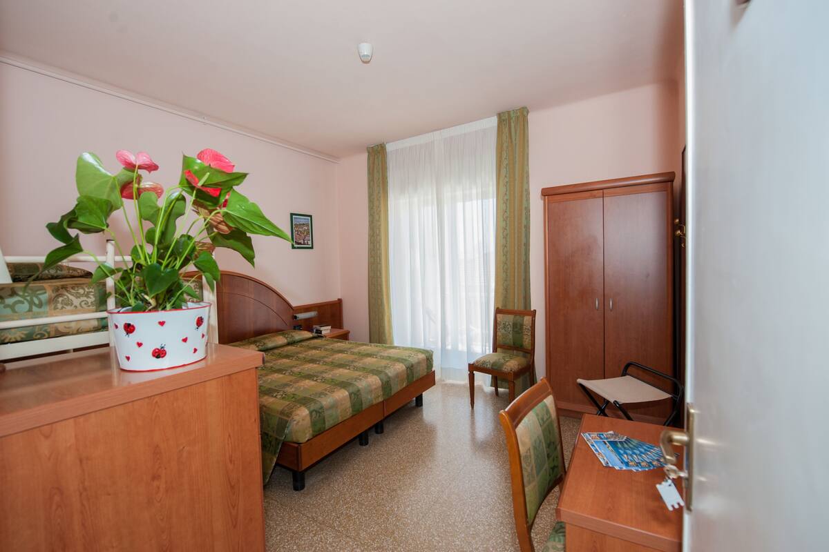 Quadruple Room, Balcony | In-room safe, desk, free WiFi