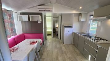 Comfort Mobile Home, 2 Bedrooms | Living area | Ping pong