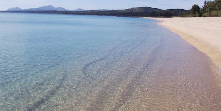 On the beach. Campeggio Villaggio Sos Flores