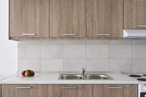 Family Apartment | Private kitchen | Oven, stovetop