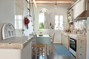 House, 2 Bedrooms (Ammos) | Private kitchen | Fridge, oven, stovetop, coffee/tea maker - Skaris Homes (Tinos)