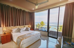 Honeymoon Room + Free Airport Transfer | Premium bedding, in-room safe, desk, iron/ironing board