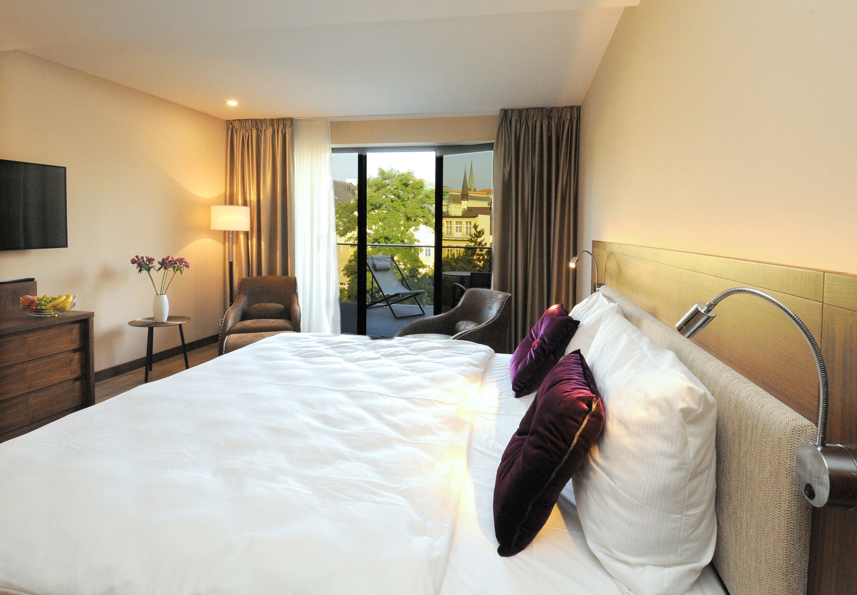 Habitació doble Deluxe, 1 llit de matrimoni gran, terrassa, vistes al pati | Roba de llit d&#x27;alta qualitat, minibar i caixa forta a l&#x27;habitació 