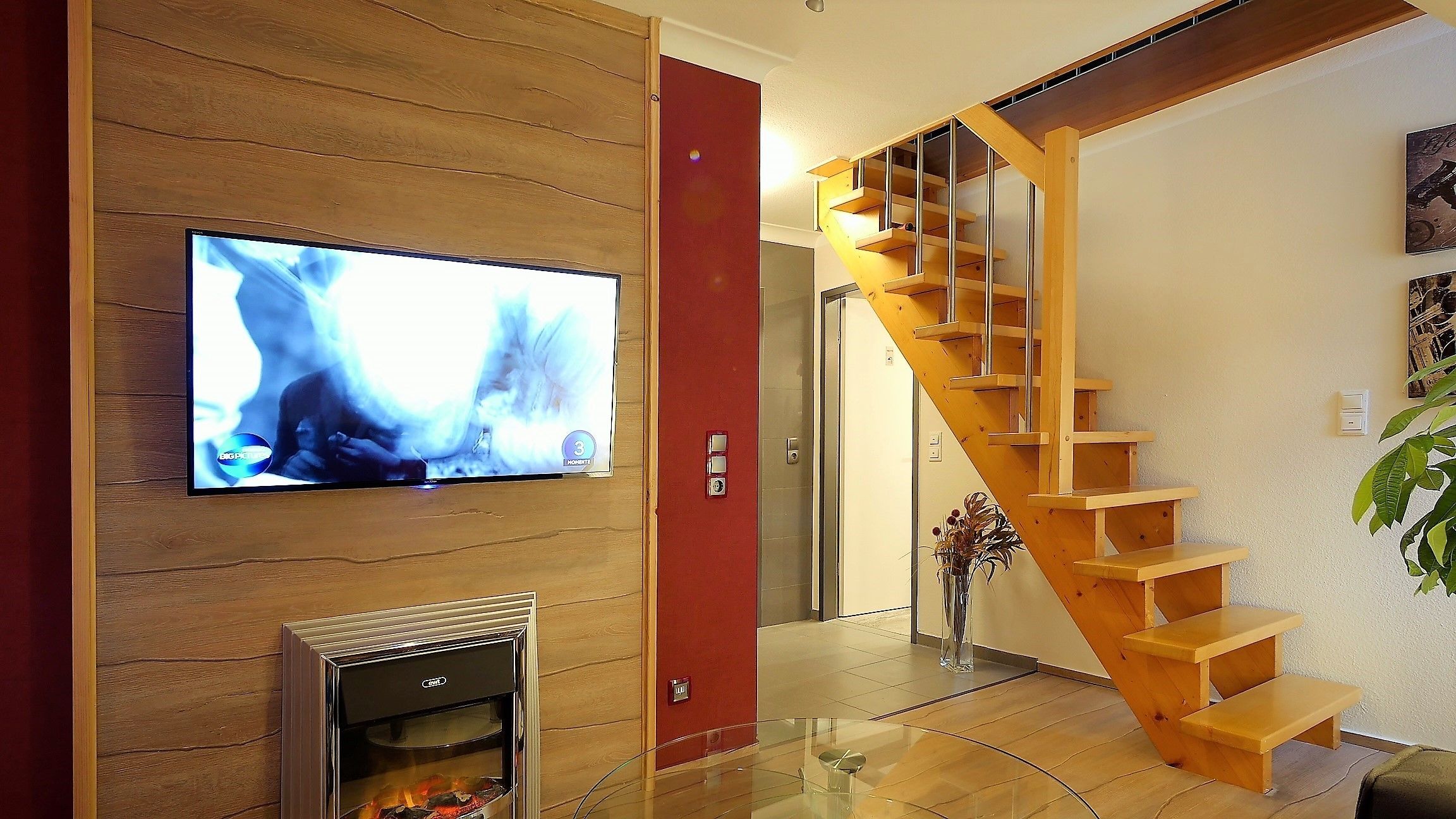 grand suite | living area | flat-screen tv