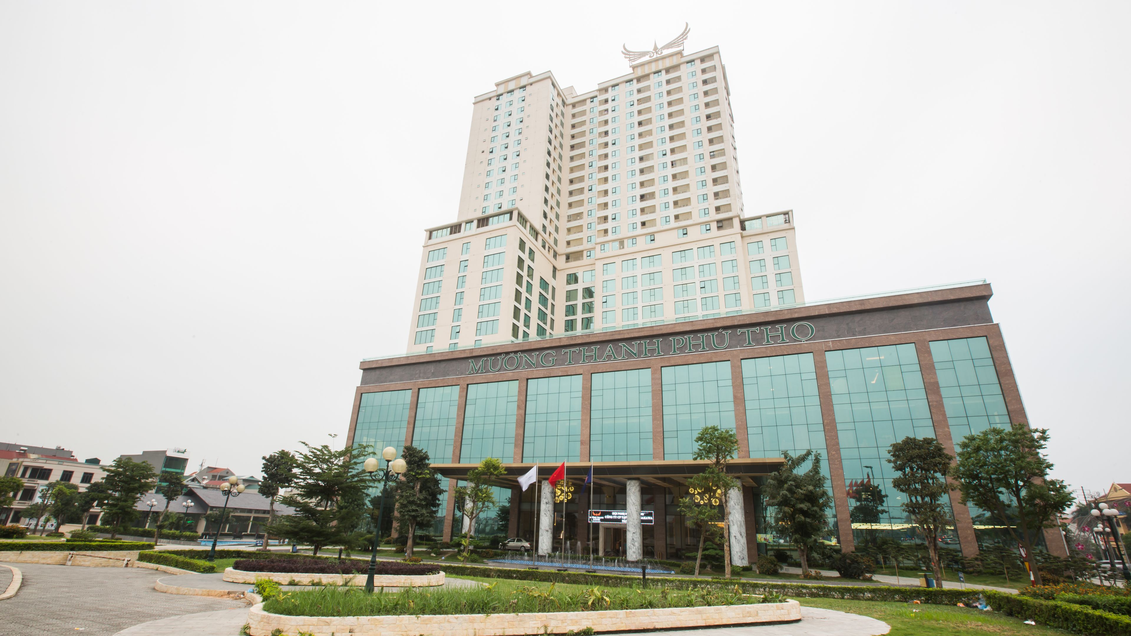 A modern building with a sign reading "MUONG THANH PHUTHO".