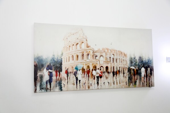 A painting of the Colosseum with people walking in front of it. - Gateway Residence (Rome)