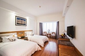 Habitación estándar | Minibar, cortinas opacas, tabla de planchar con plancha