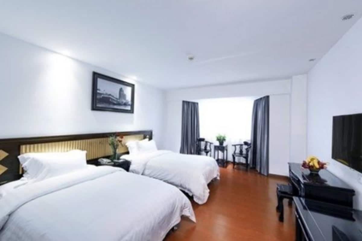Minibar, blackout curtains, iron/ironing board, rollaway beds