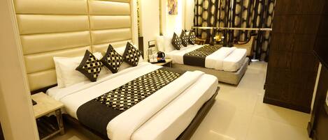 Family Room | Down duvets, pillow-top beds, desk, soundproofing