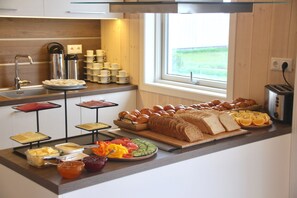 Daily local cuisine breakfast (EUR 27 per person)