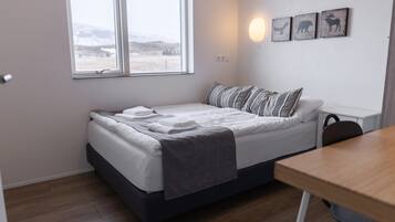 Premium bedding, blackout curtains, free WiFi, bed sheets