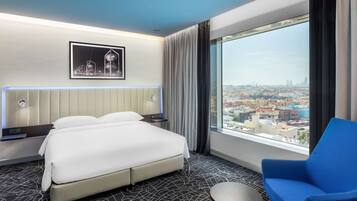 Premium bedding, down duvets, minibar, in-room safe