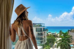 Luxurious Grand Master Suite, Partial Ocean View | 1 bedroom, in-room safe, blackout drapes, iron/ironing board