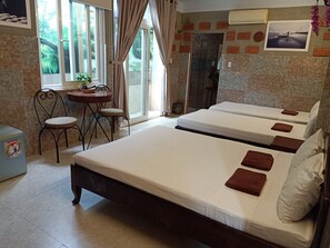 Quarto família | Frigobar, cofres nos quartos, quartos à prova de som, Wi-Fi de cortesia