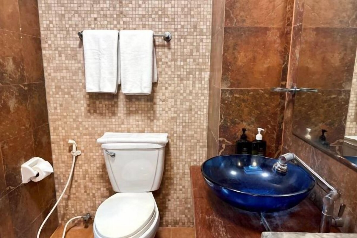 Bathroom | Shower, free toiletries, hair dryer (on request), towels
