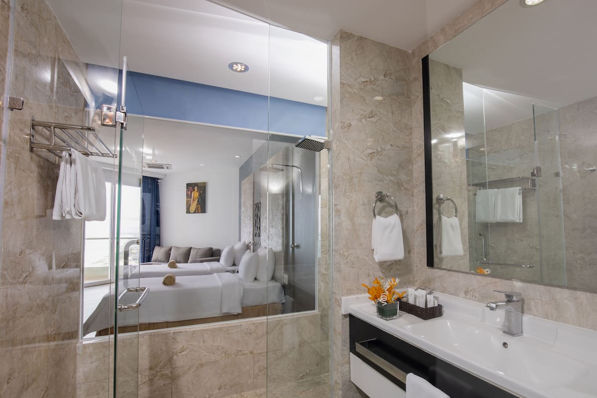 family room, 2 bedrooms, balcony, sea view | bathroom | free toiletries, hair dryer, slippers, towels