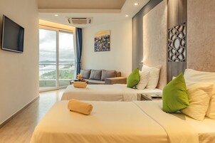 Family Room, 2 Bedrooms, Balcony, Sea View | Minibar, in-room safe, desk, laptop workspace