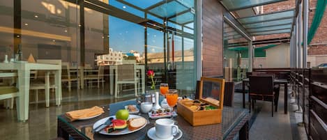 Breakfast, lunch, dinner served; international cuisine