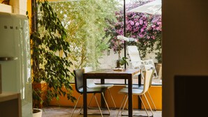 Deluxe One-Bedroom Apartment with private garden | Living area | Flat-screen TV - 54 Santa Catarina Boutique Aparthotel (Lisbon)