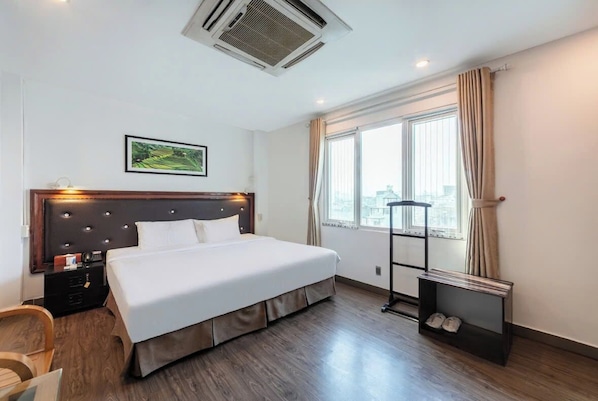 Superior Room | Minibar, in-room safe, blackout drapes, iron/ironing board - A25 Hotel - 28 Tran Quy Cap (Hanoi)