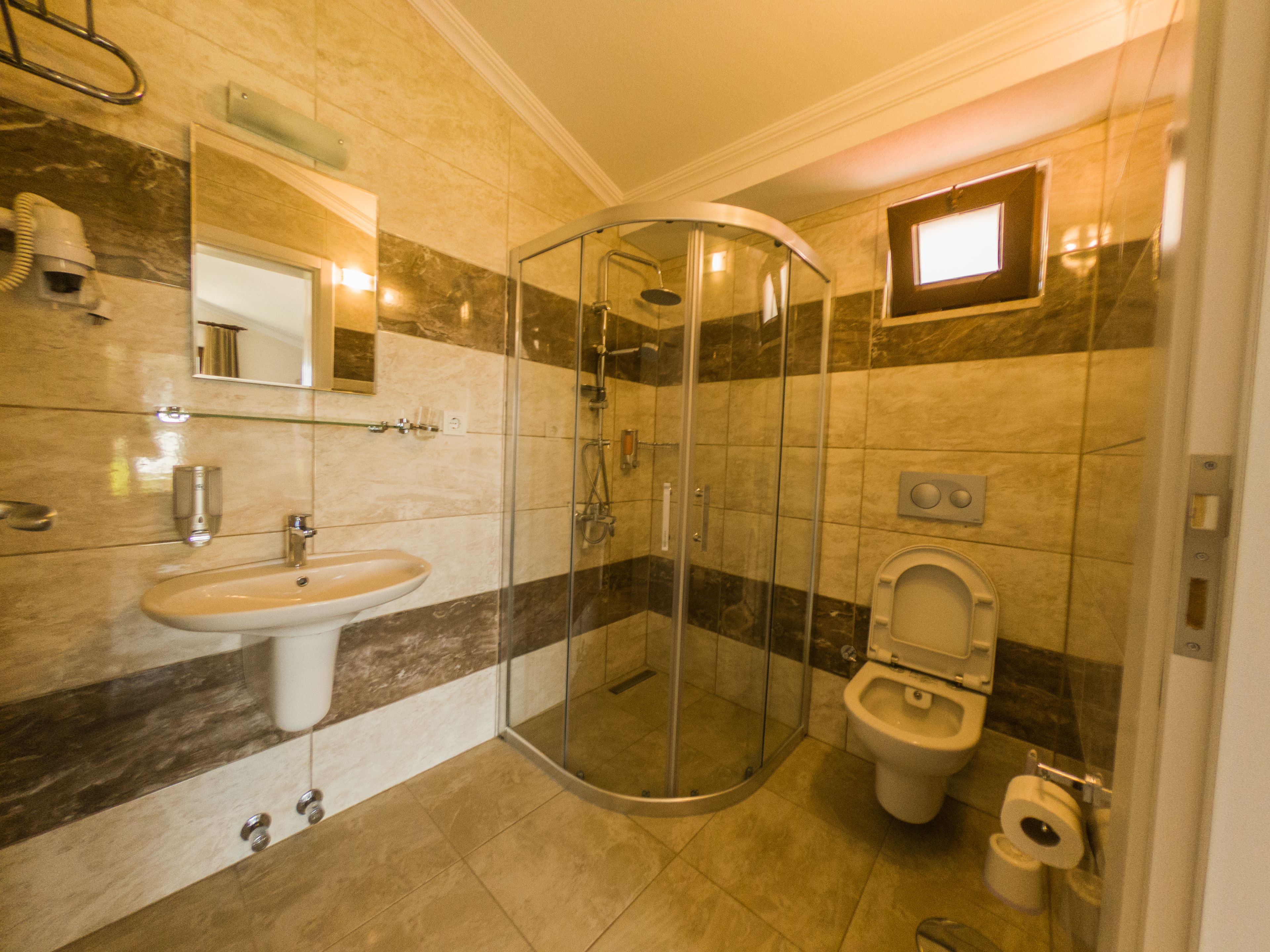 standard double or twin room | bathroom | shower, hair dryer, towels