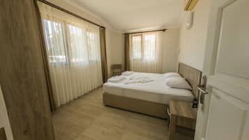 Habitación estándar con 1 cama doble o 2 individuales | Minibar, tabla de planchar con plancha, wifi gratis y ropa de cama