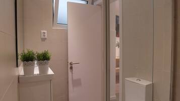 Shower, rainfall showerhead, towels