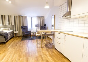 Studio, 1 Queen Bed (Top Floor) | Living area - Simloc Hotel Drottninggatan (Arjeplog)