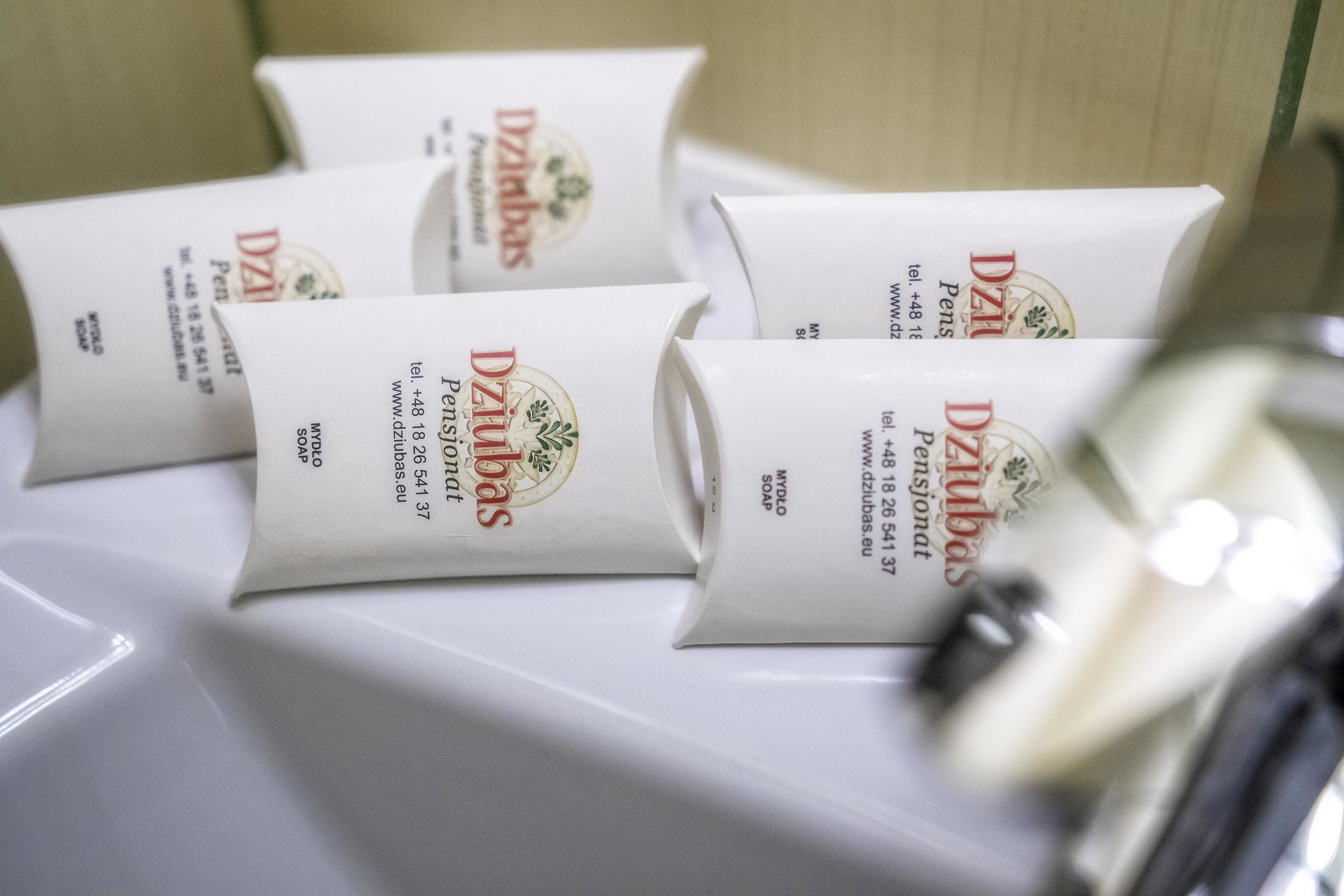 Several packages of Dziabas soap on a white surface.