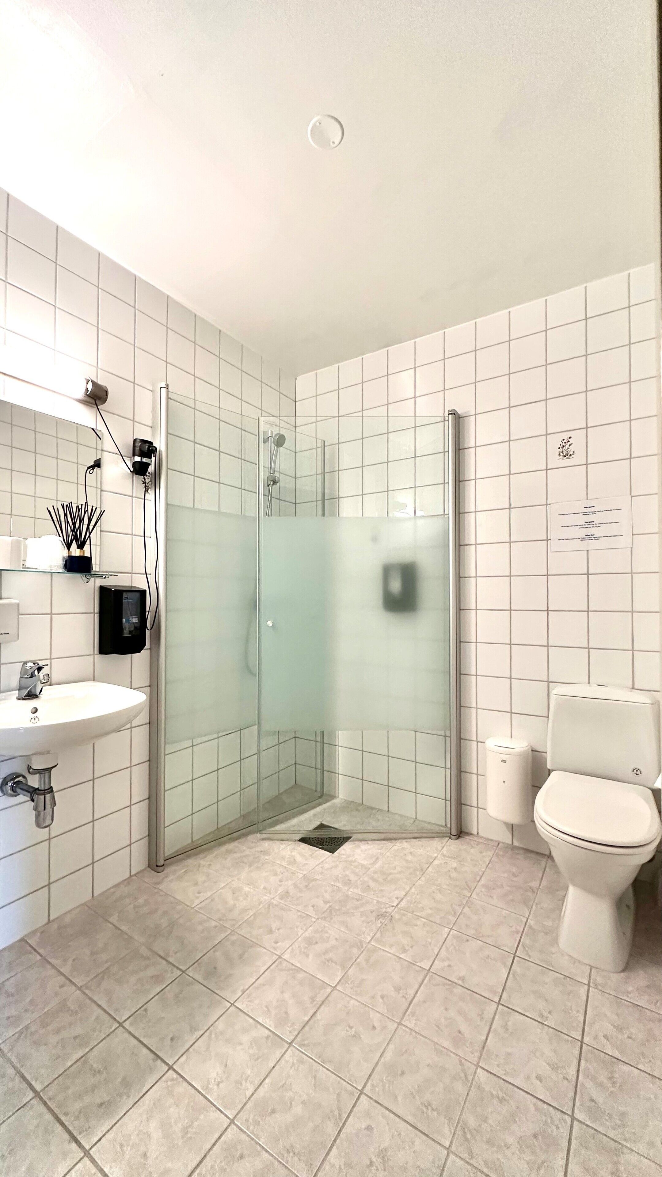 family room | bathroom | shower, hair dryer, heated floors, towels