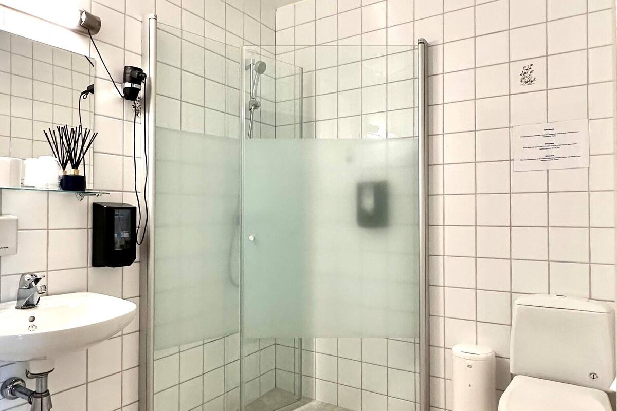 family room | bathroom | shower, hair dryer, heated floors, towels