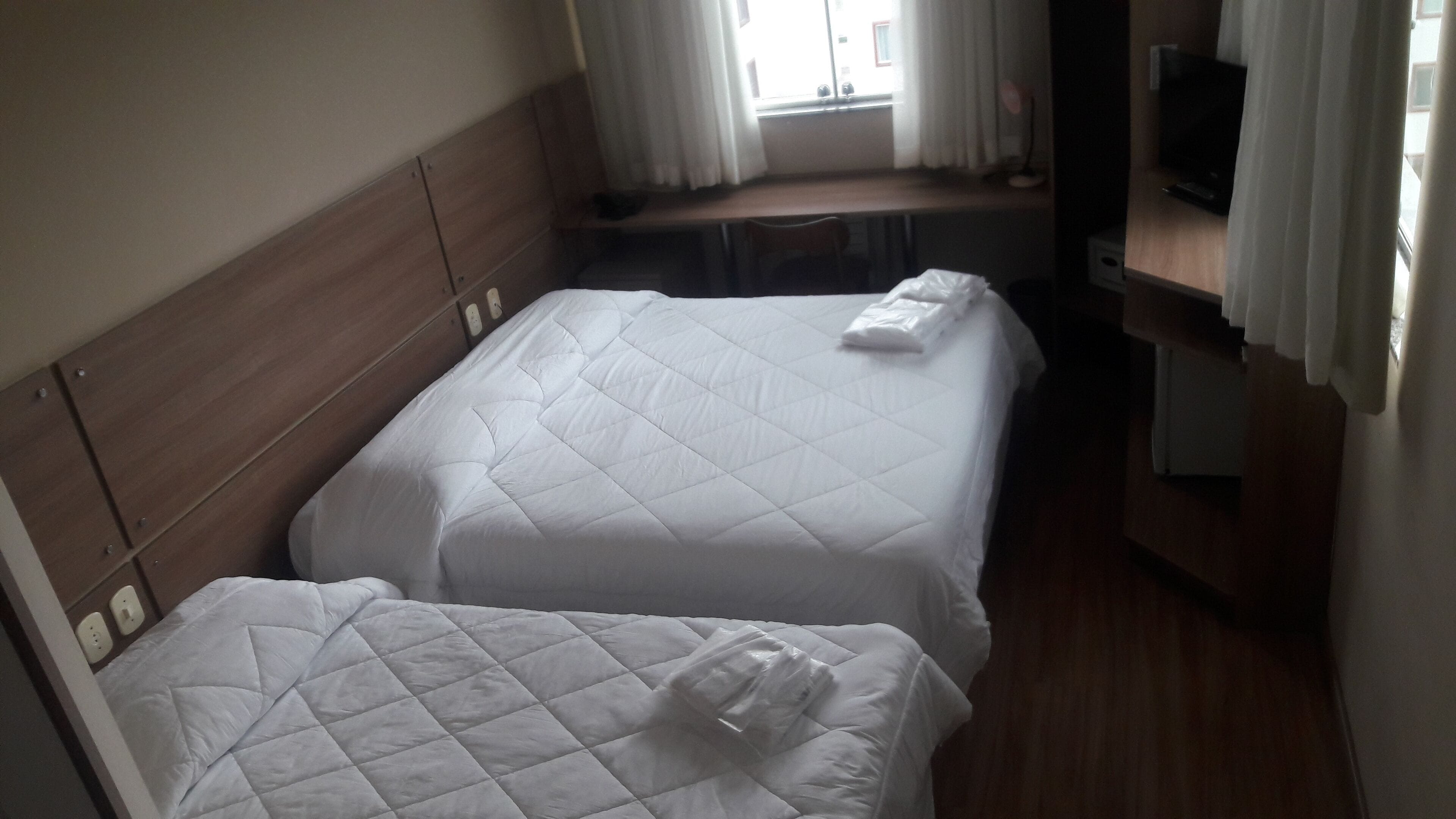 triple room | minibar, in-room safe, desk, blackout curtains