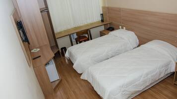 Quarto casal ou duplo | Frigobar, cofres nos quartos, escrivaninha, cortinas blackout