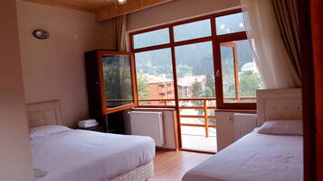 Basic Triple Room | Premium bedding, soundproofing, free WiFi